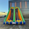 Opblaasbaar klimladder spel - Twister ladder attractie voor jong en oud Opblaasbare Twister Ladder attractie met twee steile klimmende ladders in felle kleuren voor een uitdagend spel